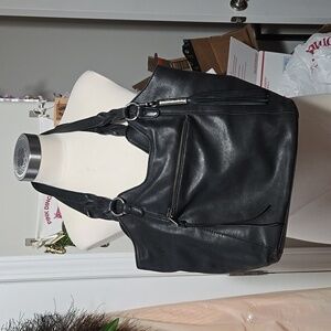 The Sak black leather tassel purse